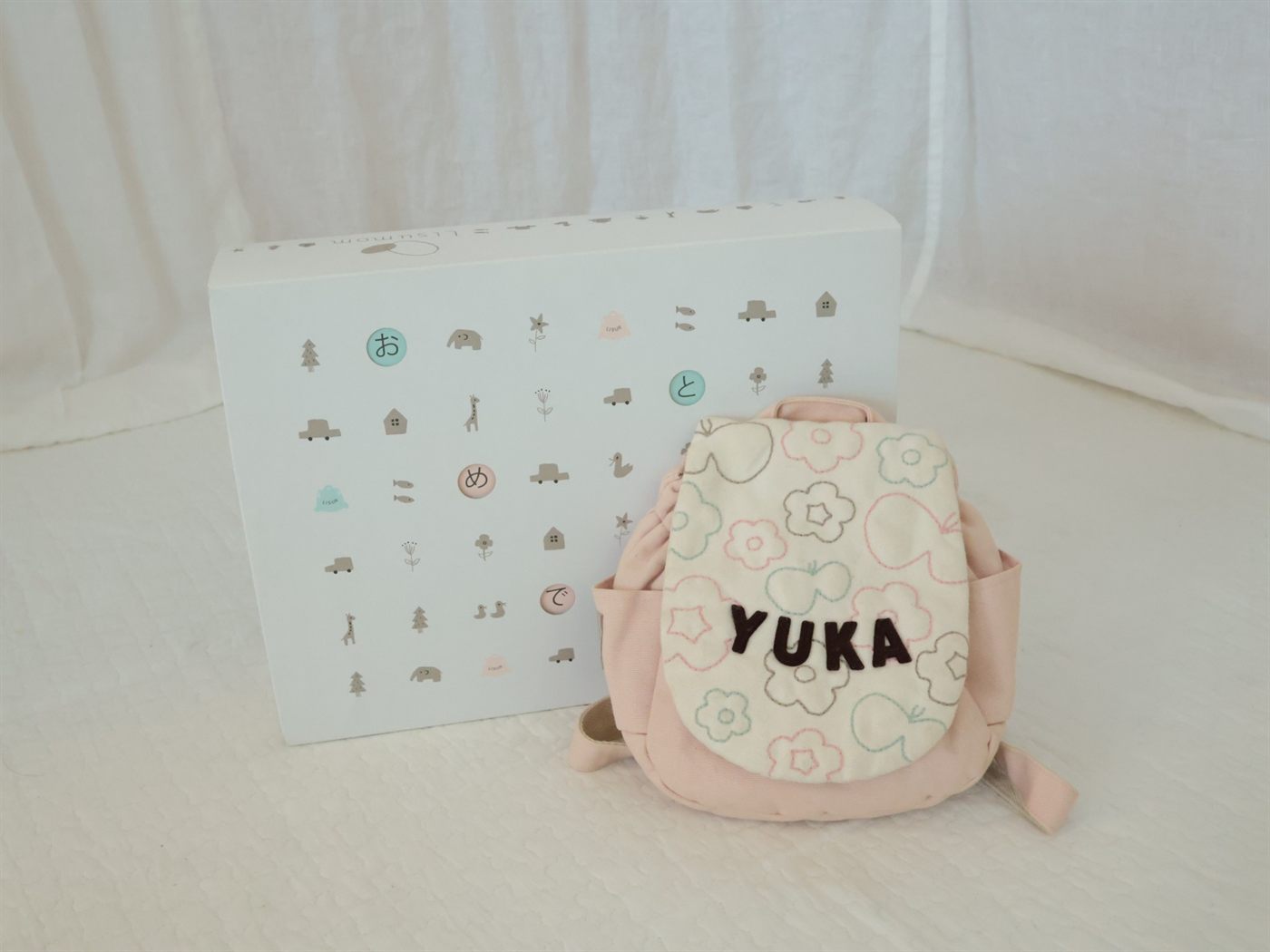 YUKAと名入れしたピンクのベビーリュック